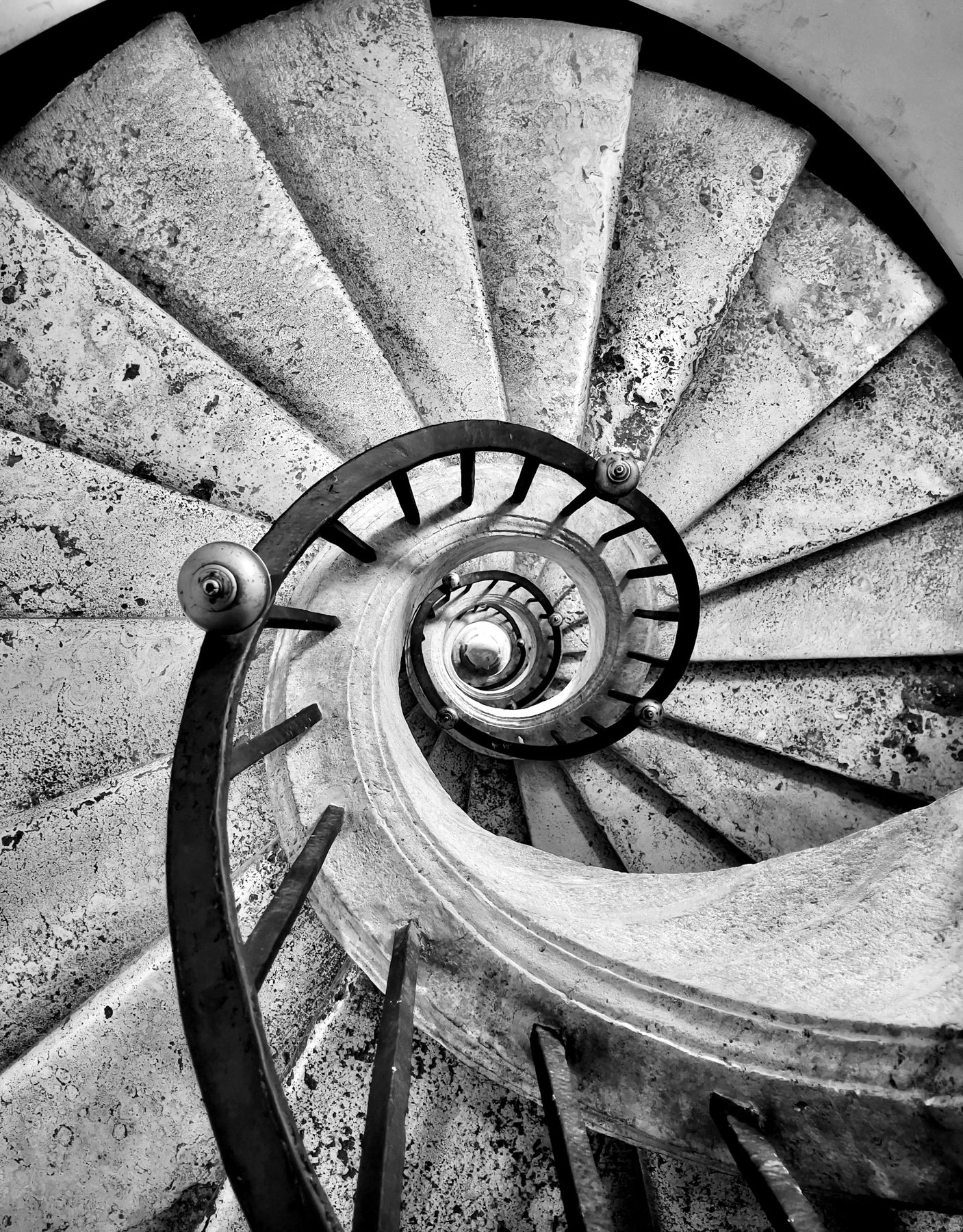 A spiral staircase seen from below
